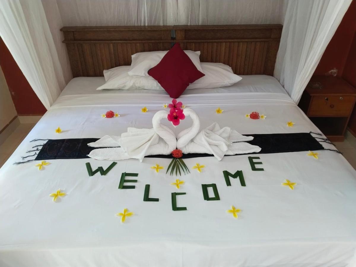 Asih Homestay Пемутеран Экстерьер фото
