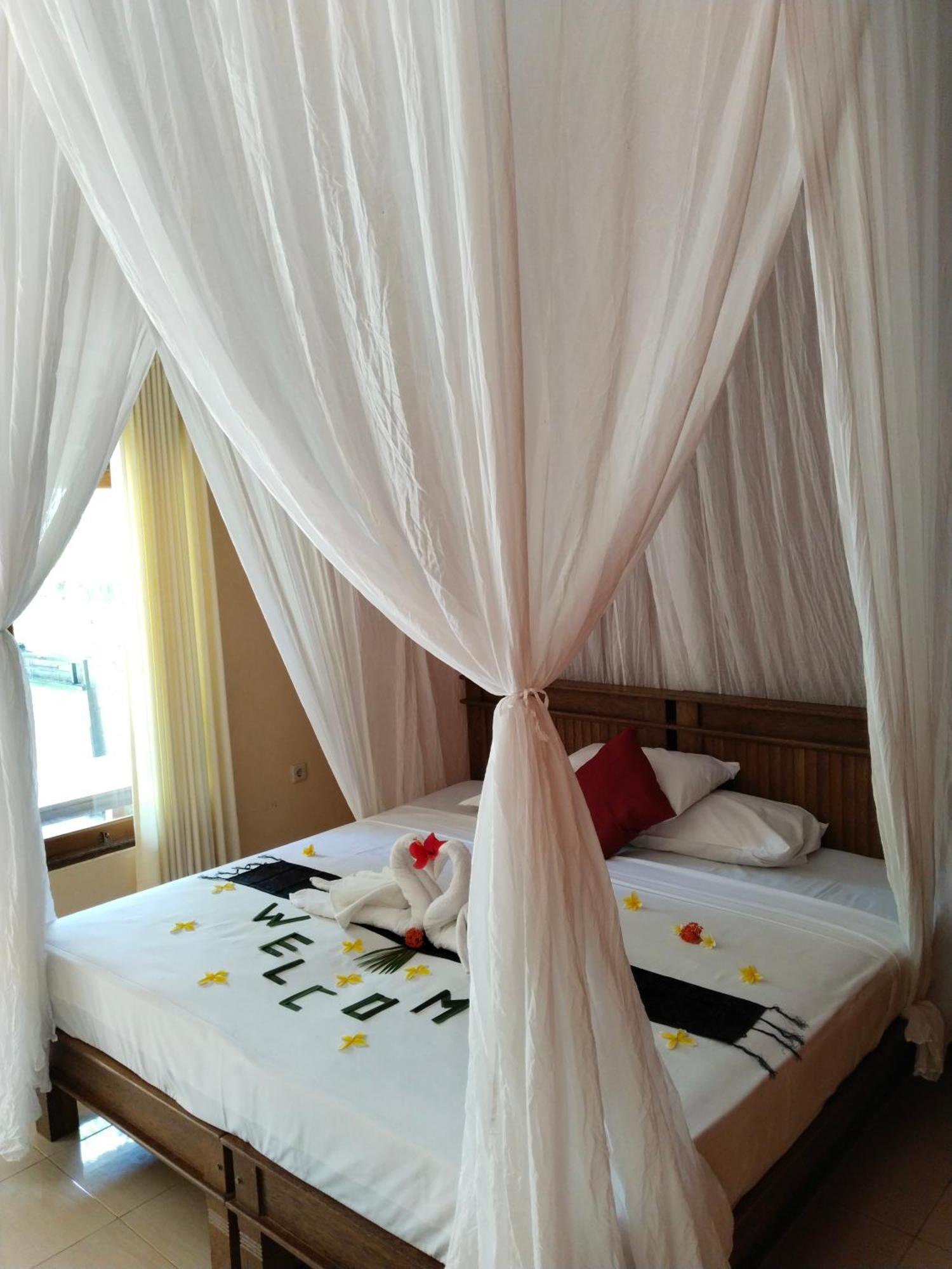 Asih Homestay Пемутеран Номер фото